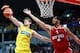 Maccabi Tel Aviv's Croatian player Dragen Bender (L) fights for the ball against Hapoel Jerusalem's US player Josh Duncan during a Winner League match between Maccabi Tel Aviv and Hapoel Jerusalem at the Pais Arena in Jerusalem on March 21, 2016.
Dragan