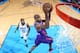 OKLAHOMA CITY, OK - FEBRUARY 4: Patrick Christopher #19 of the Iowa Energy shoots against Reggie Williams #14 of the Tulsa 66ers during an NBA D-League game on February 4, 2014 at the Chesapeake Energy Arena in Oklahoma City, Oklahoma. NOTE TO USER: User