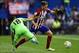 Atletico Madrid's midfielder Saul Niguez (R) vies with Getafe's midfielder Victor Rodriguez during the Spanish league football match Club Atletico de Madrid vs Getafe CF at the Vicente Calderon stadium in Madrid on September 22, 2015. AFP PHOTO/ JAVIER