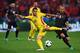 LYON, FRANCE - JUNE 19: Romania's Nicolae Stanciu under pressure from Albania's Migjen Basha during the UEFA Euro 2016 Group A match between Romania and Albania at Stade de Lyon on June 19 in Lyon, France. (Photo by Kevin Barnes/CameraSport via Getty Im