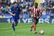 LEICESTER, ENGLAND - APRIL 03: Victor Wanyama of Southampton is chased by Leonardo Ulloa of Leicester City during the Barclays Premier League match between Leicester City and Southampton at The King Power Stadium on April 3, 2016 in Leicester, England.