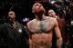 LAS VEGAS, NV - MARCH 5: Conor McGregor exits the Octagon after his fight against Nate Diaz in their welterweight bout during the UFC 196 at the MGM Grand Garden Arena on March 5, 2016 in Las Vegas, Nevada. (Photo by Rey Del Rio/Getty Images)