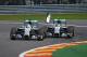 Nico Rosberg clips the rear of Lewis Hamilton's car at the 2014 Belgian Grand Prix.