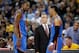 OAKLAND, CA - MARCH 03: Kevin Durant #35 and Russell Westbrook #0 of the Oklahoma City Thunder talk to head coach Billy Donovan during their game against the Golden State Warriors at ORACLE Arena on March 3, 2016 in Oakland, California. NOTE TO USER: Us