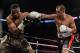 MONTREAL, QC - JANUARY 30: Sergey Kovalev of Russia throws a punch towards Jean Pascal of Canada during the WBO, WBA, and IBF light heavyweight world championship match at the Bell Centre on January 30, 2016 in Montreal, Quebec, Canada. (Photo by Minas