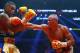 QUEBEC CITY, QC - NOVEMBER 28: Isaac Chilemba of South Africa throws a punch to Eleider Alvarez of Columbia during their WBC elimination fight at the Centre Videotron on November 28, 2015 in Quebec City, Quebec, Canada. (Photo by Mathieu Belanger/Getty I
