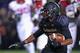 EVANSTON, IL - OCTOBER 18: Solomon Vault #15 of the Northwestern Wildcats runs against the Nebraska Cornhuskers at Ryan Field on October 18, 2014 in Evanston, Illinois. (Photo by Jonathan Daniel/Getty Images)