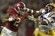 Nov 7, 2015; Tuscaloosa, AL, USA; Alabama Crimson Tide running back Derrick Henry (2) stiff-arms LSU Tigers safety Jamal Adams (33) during the second quarter at Bryant-Denny Stadium. Mandatory Credit: John David Mercer-USA TODAY Sports
