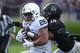 EVANSTON, IL - NOVEMBER 07: Saquon Barkley #26 is wrapped up by Godwin Igwebuike #16 of the Northwestern Wildcats at Ryan Field on November 7, 2015 in Evanston, Illinois. (Photo by JonathanDaniel/Getty Images)