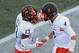LAS VEGAS, NV - OCTOBER 31: Running back Jeremy McNichols #13 is congratulated in the end zone by quarterback Brett Rypien #4 of the Boise State Broncos after McNichols ran for a 40-yard touchdown against the UNLV Rebels during their game at Sam Boyd Sta