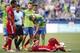 Jul 13, 2016; Seattle, WA, USA; Seattle Sounders FC midfielder Clint Dempsey (2) stands over FC Dallas midfielder Juan Ortiz (20) after fouling him during the first half at CenturyLink Field. Looking on are FC Dallas defender Aubrey David (2) and referee