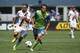 Jul 9, 2016; Seattle, WA, USA; Seattle Sounders FC forward Nelson Valdez (16) dribbles against Los Angeles Galaxy midfielder Baggio Husidic (6) during the second half at CenturyLink Field. Los Angeles defeated Seattle, 1-0. Mandatory Credit: Joe Nicholson