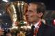 Juventus' coach from Italy Massimiliano Allegri kisses the trophy after winning the Italian Tim Cup final football match AC Milan vs Juventus on May 21, 2016 at the Olympic Stadium in Rome. Juventus won 0-1 in the extra time. AFP PHOTO / TIZIANA FABI