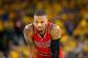 OAKLAND, CA - MAY 11: Damian Lillard #0 of the Portland Trail Blazers stands on the court during their loss to the Golden State Warriors in Game Five of the Western Conference Semifinals during the 2016 NBA Playoffs on May 11, 2016 at Oracle Arena in Oak