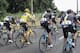 PARIS, FRANCE - JULY 24: Chris Froome of Great Britain and Team Sky sprays a bottle of beer over his team mates during stage twenty one of the 2016 Le Tour de France, from Chantilly to Paris Champs-Elysees on July 24, 2016 in Paris, France. (Photo by Ch
