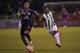 Colombia's Atletico Nacional Marlos Moreno (R) vies for the ball with Ecuador's Independiente del Valle Arturo Mina during the Copa Libertadores first leg football final, at the Atahualpa stadium in Quito on July 20, 2016. / AFP / RODRIGO BUENDIA (