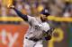 Jul 20, 2016; Pittsburgh, PA, USA; Milwaukee Brewers relief pitcher Jeremy Jeffress (21) pitches against the Pittsburgh Pirates during the ninth inning at PNC Park. Milwaukee won 9-5. Mandatory Credit: Charles LeClaire-USA TODAY Sports