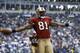 IRVING, TX - DECEMBER 8: Wide receiver Terrell Owens #81 of the San Francisco 49ers celebrates in the end zone after scoring a touchdown against the Dallas Cowboys with 12 seconds left on December 8, 2002 at Texas Stadium in Irving, Texas. The 49ers bea