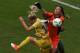Sweden player Sofia Jakobsson (L) vie for the ball with South Africa goalkeeper Roxanne Barker during the Rio 2016 Olympic Games womens First Round Group E football match Sweden vs South Africa, at the Olympic Stadium in Rio de Janeiro on August 3, 2016.