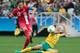 Christine Sinclair curling in Canada's second goal.