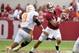 Oct 24, 2015; Tuscaloosa, AL, USA; Alabama Crimson Tide quarterback Jake Coker (14) under pressure from Tennessee Volunteers defensive end Derek Barnett (9) during the second quarter at Bryant-Denny Stadium. Mandatory Credit: John David Mercer-USA TODAY S