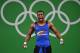 Colombia's Oscar Albeiro Figueroa Mosquera reacts while competing in the Men's 62kg weightlifting competition at the Rio 2016 Olympic Games in Rio de Janeiro on August 8, 2016. / AFP / GOH Chai Hin (Photo credit should read GOH CHAI HIN/AFP/Getty