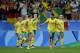 The Matildas celebrate scoring against Germany.