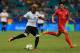 SALVADOR, BRAZIL - AUGUST 07: Serge Gnabry of Germany runs with the ball against Sangmin Sim of Korea during the Men's First Round Group C match between Germany and Korea at Arena Fonte Nova on August 7, 2016 in Salvador, Brazil. (Photo by Felipe Olivei