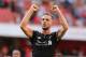 Liverpool's English midfielder Jordan Henderson celebrates victory after the final whistle of the English Premier League football match between Arsenal and Liverpool at the Emirates Stadium in London on August 14, 2016. / AFP / Lee MILLS / RESTRICTED TO