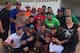 Rougned (in green T-shirt and sunglasses) poses with some of his baseball-playing family members and friends at a baseball field in Venezuela on New Year's Eve.