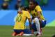 Brazil's player Bruna (R) comforts teammate Marta after losing to Sweden in their Rio 2016 Olympic Games Women's semi-final football match at the Maracana Stadium in Rio de Janeiro, Brazil, on August 16, 2016. / AFP / VAN