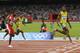 Usain Bolt celebrates as he wins the 100 meters in Beijing.