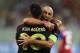 Manchester City's Argentinian striker Sergio Aguero (front) celebrates with Manchester City's Argentinian defender Pablo Zabaleta after scoring a goal during the UEFA Champions league first leg play-off football match between Steaua Bucharest and Manchest