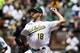 OAKLAND, CA - JULY 17: Rich Hill #18 of the Oakland Athletics pitches against the Toronto Blue Jays during the first inning at the Oakland Coliseum on July 17, 2016 in Oakland, California. (Photo by Jason O. Watson/Getty Images)