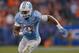 CHARLOTTE, NC - DECEMBER 05: Elijah Hood #34 of the North Carolina Tar Heels runs against the Clemson Tigers during the Atlantic Coast Conference Football Championship at Bank of America Stadium on December 5, 2015 in Charlotte, North Carolina. Clemson w
