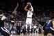 Mar 26, 2016; Louisville, KY, USA; Kansas Jayhawks guard Devonte' Graham (4) shoots the ball against Villanova Wildcats forward Daniel Ochefu (23) during the second half of the south regional final of the NCAA Tournament at KFC YUM!. Mandatory Credit: Aar