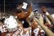Sep 4, 2016; Austin, TX, USA; Texas Longhorns players lift up head coach Charlie Strong after the victory against the Notre Dame Fighting Irish at Darrell K Royal-Texas Memorial Stadium. Mandatory Credit: Kevin Jairaj-USA TODAY Sports