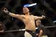 Jul 13, 2016; Sioux Falls, SD, USA; Sam Alvey (blue gloves) reacts after defeating Eric Spicely (not pictured) during UFC Fight Night at Denny Sanford Premier Center. Mandatory Credit: Brad Rempel-USA TODAY Sports