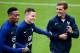 TOPSHOT - France's forward Antoine Griezmann (R) jokes with forward Kevin Gameiro (C) and forward Anthony Martial during a training session in Clairefontaine-en-Yvelines on August 29, 2016, as part of the team's preparation for the upcoming friendly footb