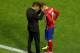 MILAN, ITALY - MAY 28: Antoine Griezmann of Atletico Madrid speaks to head coach Diego Simeone during the UEFA Champions League Final match between Real Madrid and Club Atletico de Madrid at Stadio Giuseppe Meazza on May 28, 2016 in Milan, Italy. (Photo