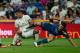 Real Madrid's Brazilian midfielder Casemiro (L) vies with Celta Vigo's Chilean forward Fabian Orellana during the Spanish league football match Real Madrid CF vs RC Celta de Vigo at the Santiago Bernabeu stadium in Madrid on August 27, 2016. / AFP / PIERR