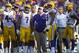 Sep 3, 2016; Green Bay, WI, USA; LSU Tigers head coach Les Miles looks to the scoreboard surrounded by players during the fourth quarter against the Wisconsin Badgers at Lambeau Field. Mandatory Credit: Jeff Hanisch-USA TODAY Sports