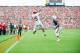 AUBURN, AL - SEPTEMBER 12: Wide receiver Ruben Gonzalez #15 of the Jacksonville State Gamecocks attempts to catch a pass in front of defensive back Johnathan Ford #23 of the Auburn Tigers on September 12, 2015 at Jordan-Hare Stadium in Auburn, Alabama. Th