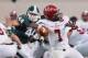 EAST LANSING, MI - AUGUST 29: Marcus Rush #44 of the Michigan State Spartans closes in on Quarterback Eli Jenkins #7 of the Jacksonville State Gamecocks during the first half at Spartan Stadium on August 29, 2014 in East Lansing, Michigan. (Photo by Duan