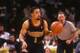 LANDOVER, MD - FEBUARY 19: Mahmoud Abdul-Rauf #1 of the Denver Nuggets dribbles up court during a NBA basketball game against the Washington Bullets on Febuary 19, 1995 at USAir Arena in Landover, Maryland. (Photo by Mitchell Layton/Getty Images)