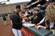 Britton signing autographs for his many new fans