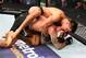 Mickey Gall in control of CM Punk.