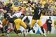Sep 18, 2016; Pittsburgh, PA, USA; Pittsburgh Steelers quarterback Ben Roethlisberger (7) throws a pass against the Cincinnati Bengals during the first half at Heinz Field. Mandatory Credit: Jason Bridge-USA TODAY Sports