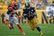 PITTSBURGH, PA - SEPTEMBER 18: DeAngelo Williams #34 of the Pittsburgh Steelers rushes against Dre Kirkpatrick #27 of the Cincinnati Bengals in the second half during the game at Heinz Field on September 18, 2016 in Pittsburgh, Pennsylvania. (Photo by Ju