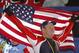 PARK CITY, UNITED STATES: Brian Shimer the pilot for USA 2 celebrates his team's third place to win the bronze medal during the flower ceremony for the four-man bobsleigh event in the Salt Lake 2002 Olympic Winter Games at the Utah Olympic Park, 23 Fe